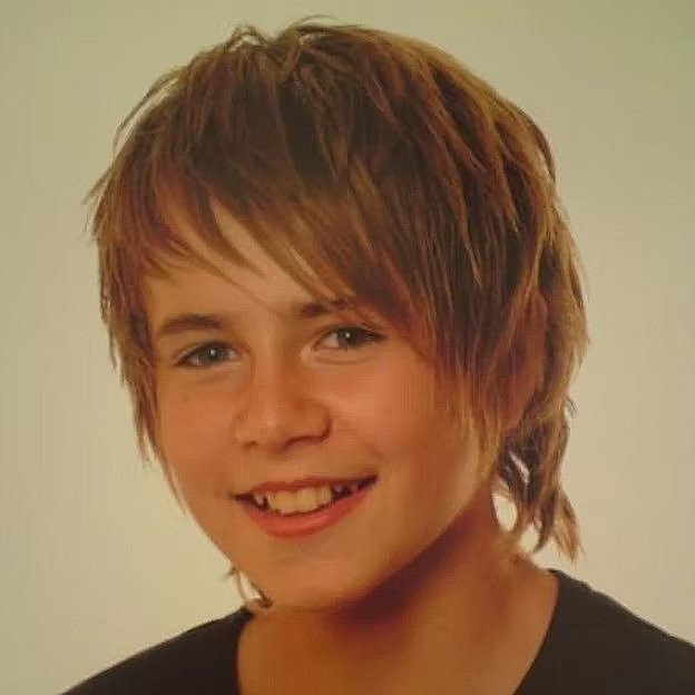 12-årige Kristoffer Lundholm havde i en periode Justin Bieber-hår. "Der var nok en halv ID-voks i," siger han. Foto: Privatfoto